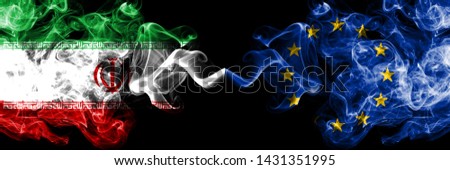 Iran vs European Union, EU smoky mystic states flags placed side by side. Thick colored silky smokes flag combination of Iranian and European Union, EU