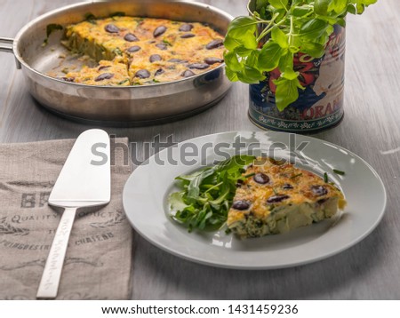 A Tasty Pie along with Salad Leaves, Food Photography.