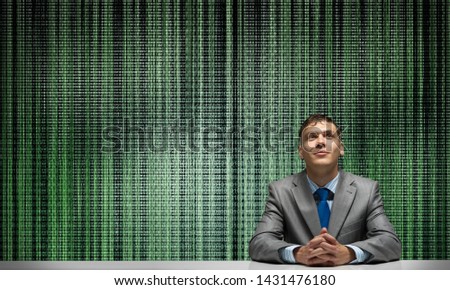 Smiling man folded hands and looking upward. Digital technology for business. Happy businessman sitting at desk. Guy in business suit and tie on abstract digital science fiction matrix like background
