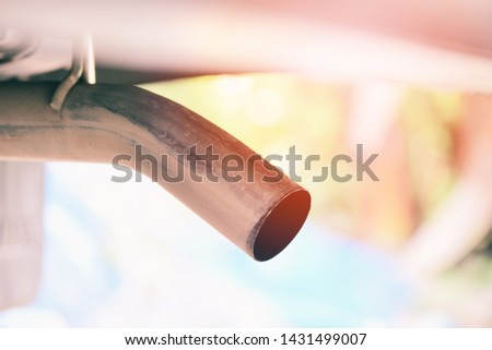 Exhaust pipe on pickup truck car close up / Car pollution concept