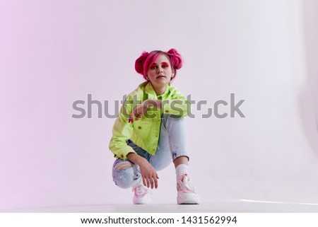 woman with pink hair squat retro style fashion