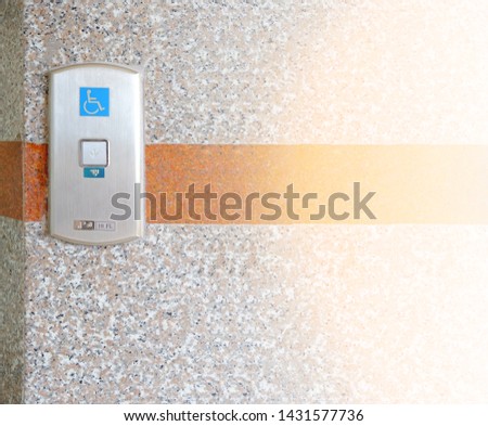 Elevator floor selection button for the visually impaired with warm light