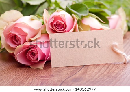 pink roses with gift card