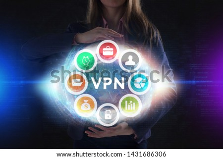 The concept of business, technology, the Internet and the network. A young entrepreneur working on a virtual screen of the future and sees the inscription: VPN