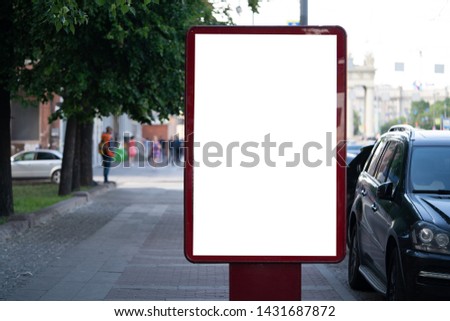advertising mockup for ad placement in the street with blurred people