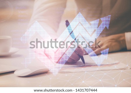 Businessman with creative business upward arrows on people hands background. Financial growth concept. Double exposure