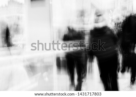 Street abstract - long exposure of people on the high street - intentional camera shake to introduce an impressionistic effect and light trails - creative filter applied creating a ghostly aesthetic