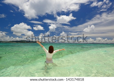 Woman swiming at the beach