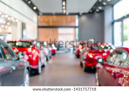 blur view of row new modern car in showroom Royalty-Free Stock Photo #1431757718