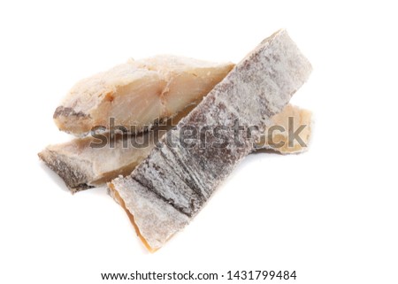 Close up view of a portuguese salted codfish isolated on white background.