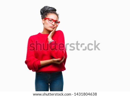 Young braided hair african american girl wearing sweater and glasses over isolated background thinking looking tired and bored with depression problems with crossed arms.