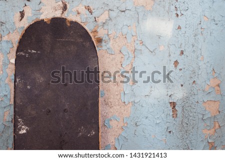 old skate on the background of the old wall