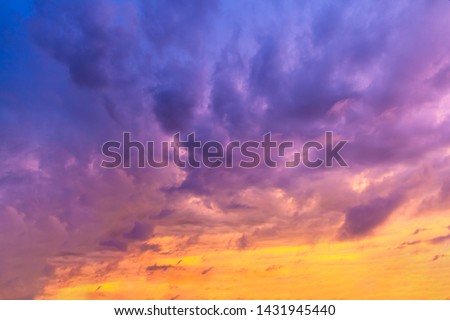 bright clouds of unusual purple colors during sunset