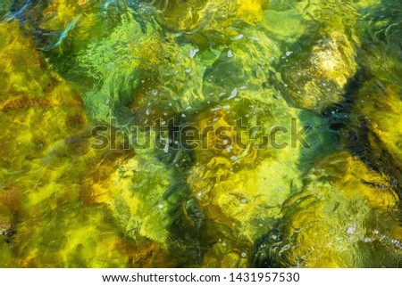Clear water in colorful colors in abstract patterns. Roslagen, Scandinavia, Sweden
