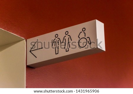Men's, women's and handicapped toilet sign.
