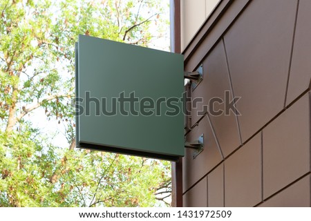 Blank green square outdoor business signage mock up.