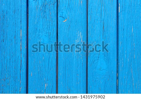 Blue wooden boards. Vertical view. Close-up. Background. Texture.