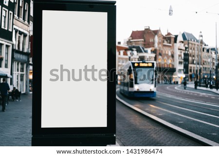 Clear Billboard on city street with blank copy space screen for advertising or promotional poster content, empty mock up Lightbox for information, blank display outdoors in urban area