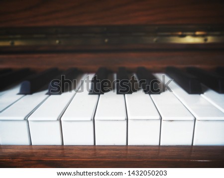 Close up of piano and shadow