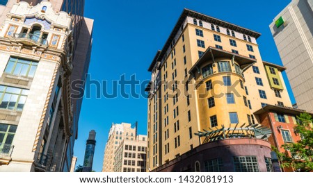 Downtown buildings along the Riverwalk in San Antonio , Texas , USA