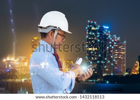 Double exposure engineer  connecting to public WiFi hot spot in the city to access internet on smartphone concept for control his work and business technology 4.0 connection.