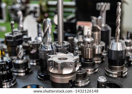 Milling tools in CNC machine chop Royalty-Free Stock Photo #1432126148