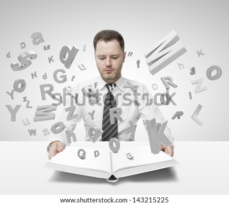 businessman holding book with many letters