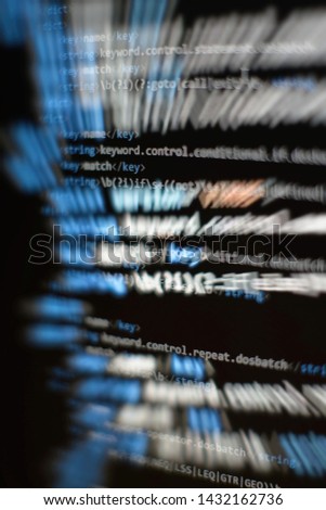 Coding application by programmer developer. Web app coding. Script on computer with source code. Programming code abstract background screen of software. Violet purple color.