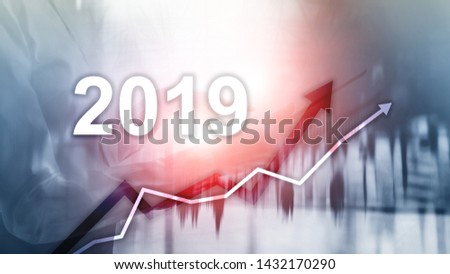 New year 2019 Financial growth graph on blurry business background.