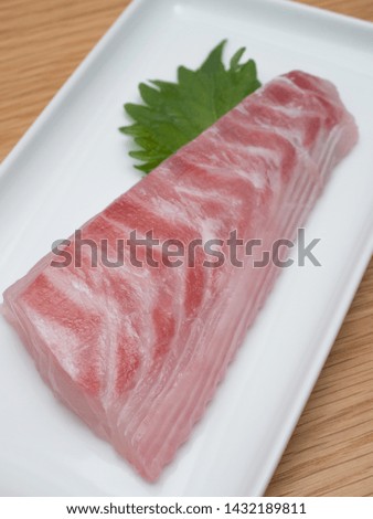 Fillet of red sea bream for making sashimi. Royalty-Free Stock Photo #1432189811