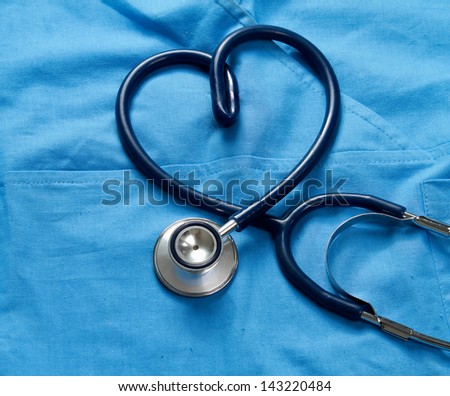 Doctor coat with stethoscope Royalty-Free Stock Photo #143220484