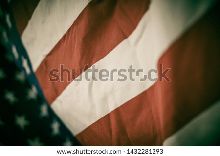 Close up America flag waving with the wind for memorial day. National symbol concept.