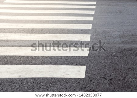 crosswalk on the street background with sunlight