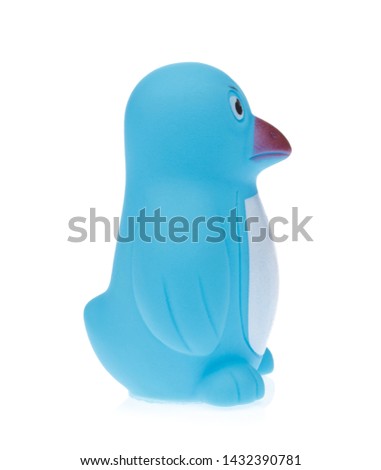 Plastic Toy Animal Penguin isolated on white background