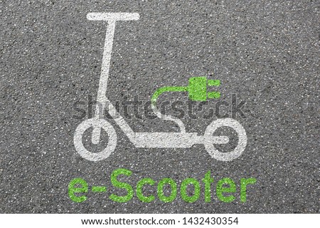 Electric scooter e-scooter road sign eco friendly green mobility city transport street Royalty-Free Stock Photo #1432430354