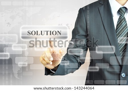 Businessman pressing  SOLUTION button