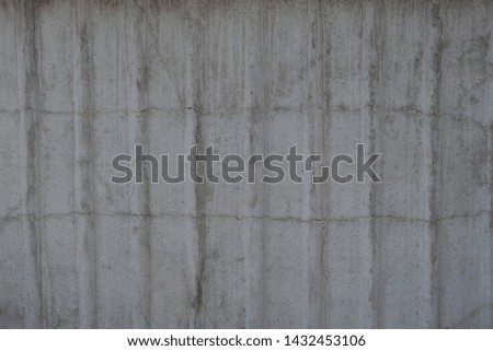 gray stone texture from old striped concrete wall