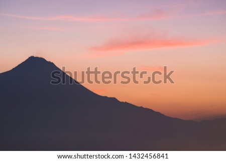 Silhouette of Mount Merapi before sunrise.