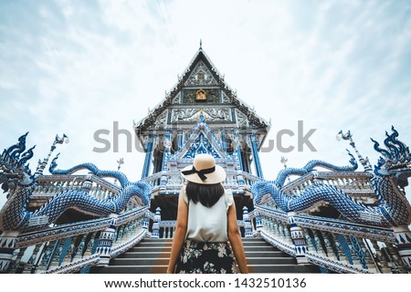 Asian traveller woman travel in Wat Pak Nam Khaem Nu temple, Chanthaburi, Thailand Royalty-Free Stock Photo #1432510136
