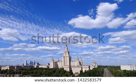 Wide angle panoramic view of Moscow  university campus under dramatic sky in summer