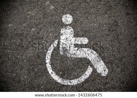 Parking for the disabled on the road, symbol and background