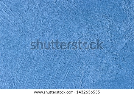 Texture of blue decorative plaster or concrete. Abstract stucco background for design. Art stylized banner with copy space for text.