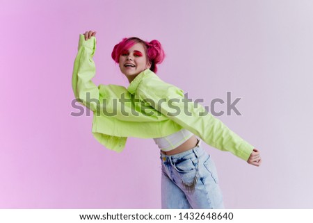 woman in green jacket fashion style dancing