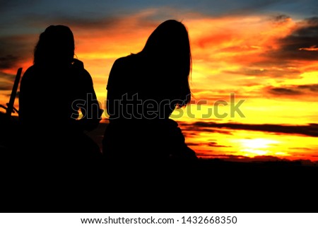 
two Girl in black silhouette