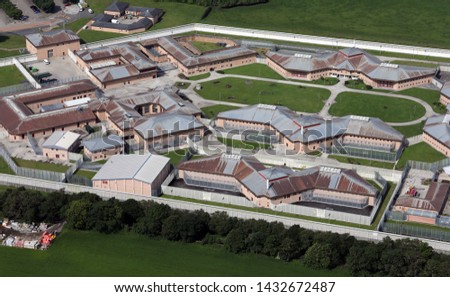 close up aerial view of a British jail or prison Royalty-Free Stock Photo #1432672487