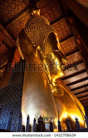 Reclining Buddha Golden Statue which represents the entry of Buddha into Nirvana Wat Pho Bangkok Thailand