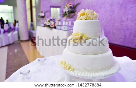 image of a wedding cake decorated with flowers