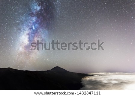 Milky Way Star Night Sky Time Lapse over Teide National Park in Tenerife / Canary Islands. Cloud Sea over La Orotava Landscape