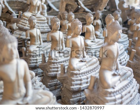 Buddha images are waiting for finishing in a Buddha foundry in Phitsanulok, Thailand