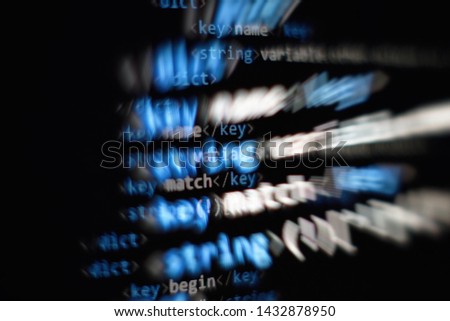 Coding application by programmer developer. Web app coding. Script on computer with source code. Programming code abstract background screen of software. Violet purple color.
